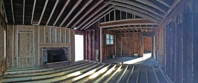 Great room view from the back door looking toward the kitchen.