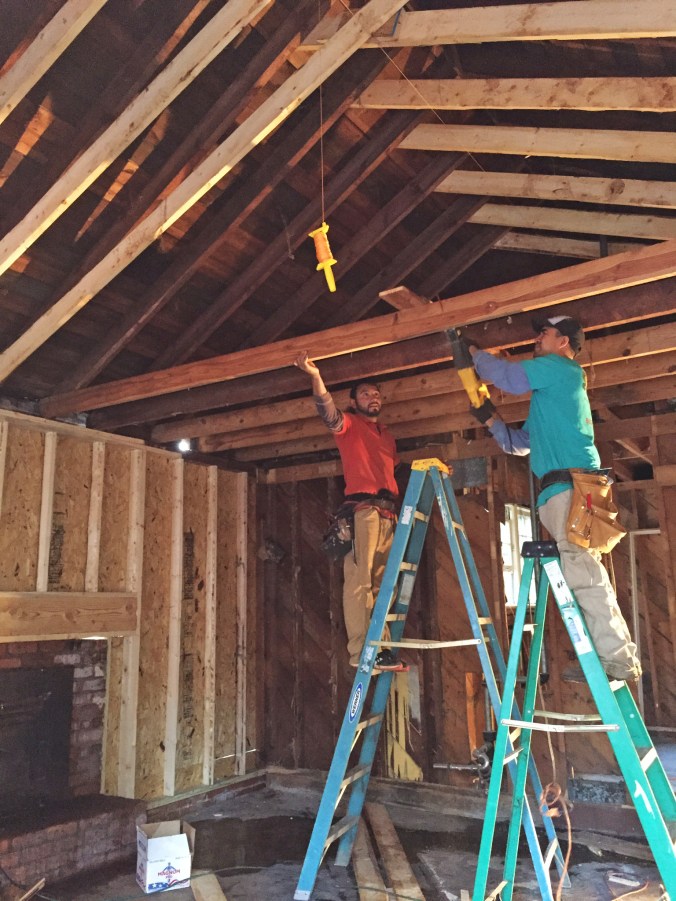New scissor joists are in the ceiling, so the old cross beams are coming out!