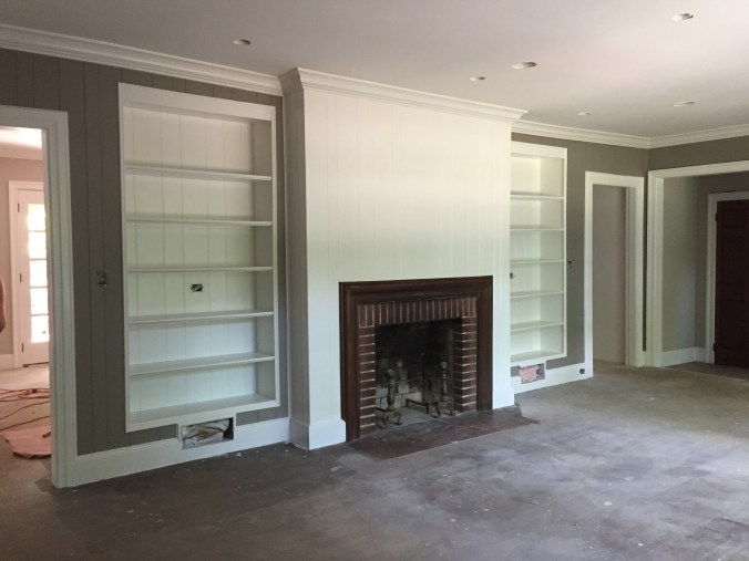 Although painting the wormy chestnut was a really tough decision, we feel like this is an improvement that brightens the room and makes it feel less disjointed. 