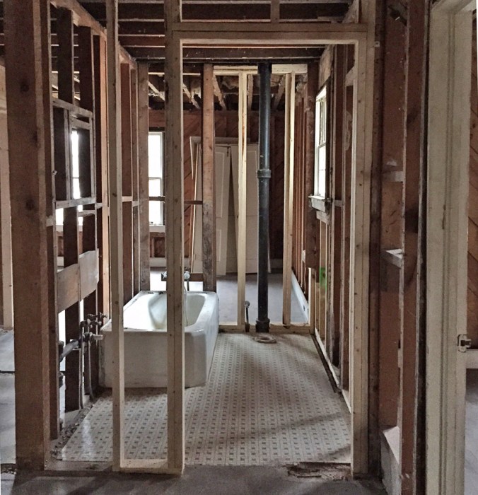 See the giant black pipe right where we want to put the cabinet?