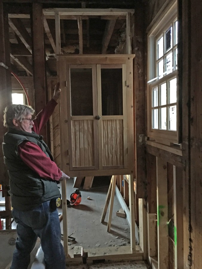 Holding it up to make sure we like it :)