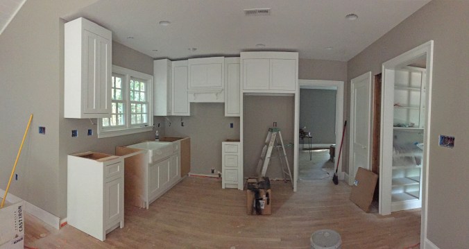 Cabinets going in... no island yet!